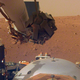 The Martian surface, as imaged by the Instrument Deployment Camera attached to InSight’s robotic arm.